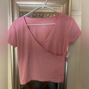 Cute pink top. Ribbed with stretch, size large